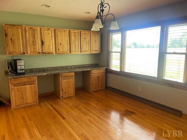 2836 Red House Road Rustburg, VA 24588 - Photo 10 of 74 a view of a kitchen with a sink cabinets and wooden floor