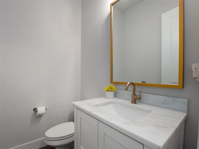 a bathroom with a sink and a toilet