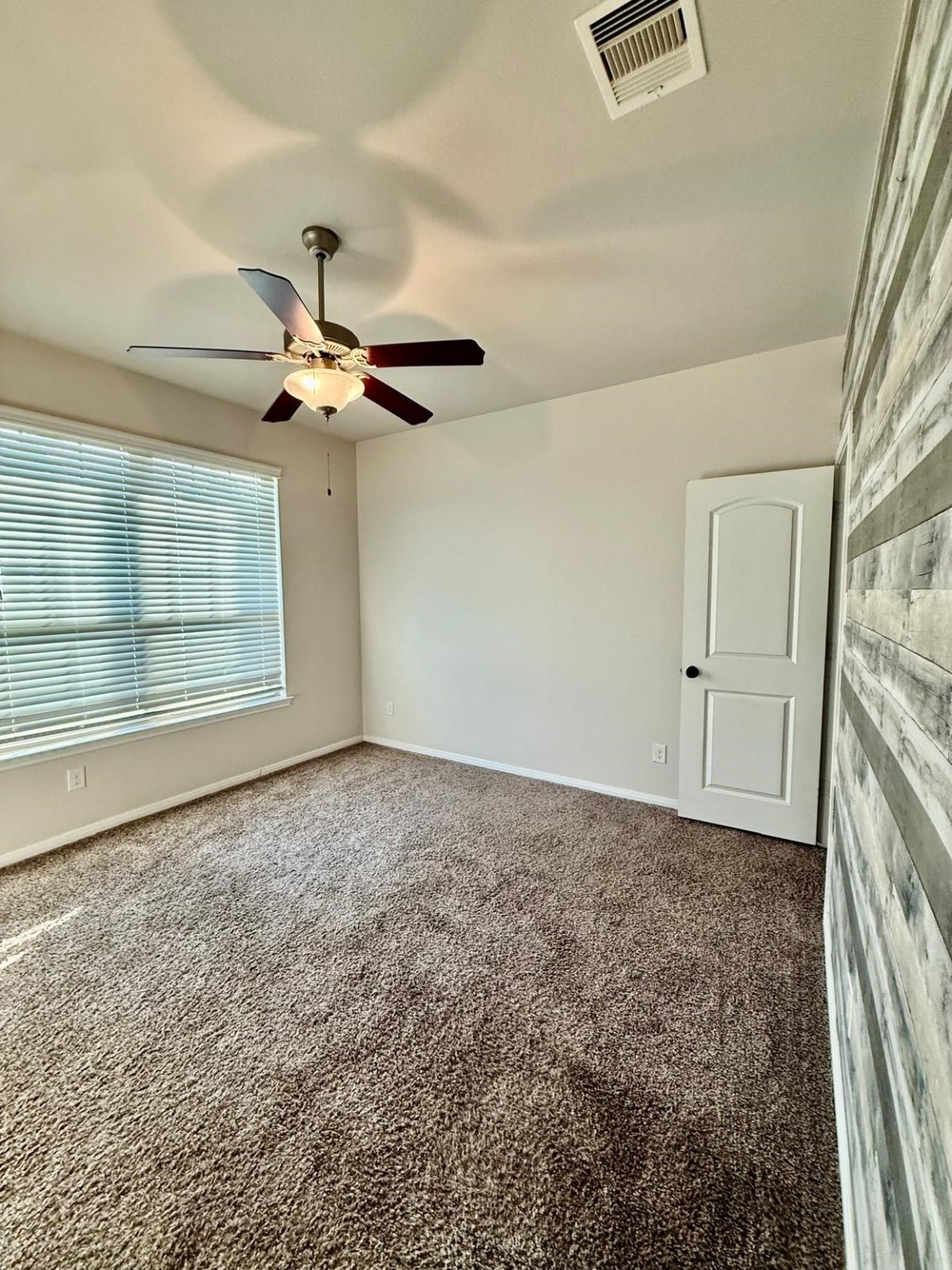 14208 Wallowa Ridge Lane Conroe, TX 77384 - Photo 17 of 48 a view of an empty room