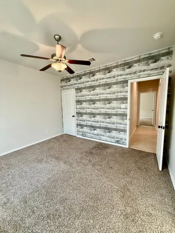 a bathroom with a bathtub and toilet
