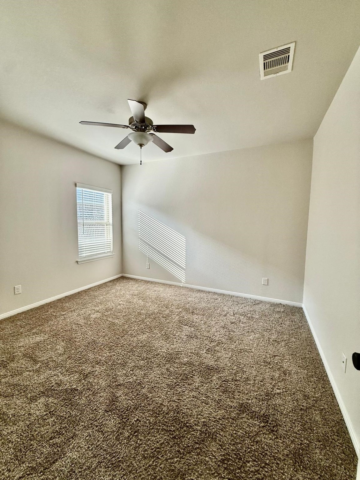 14208 Wallowa Ridge Lane Conroe, TX 77384 - Photo 23 of 48 a view of a window in an empty room