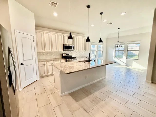 a view of a livingroom with a chandelier