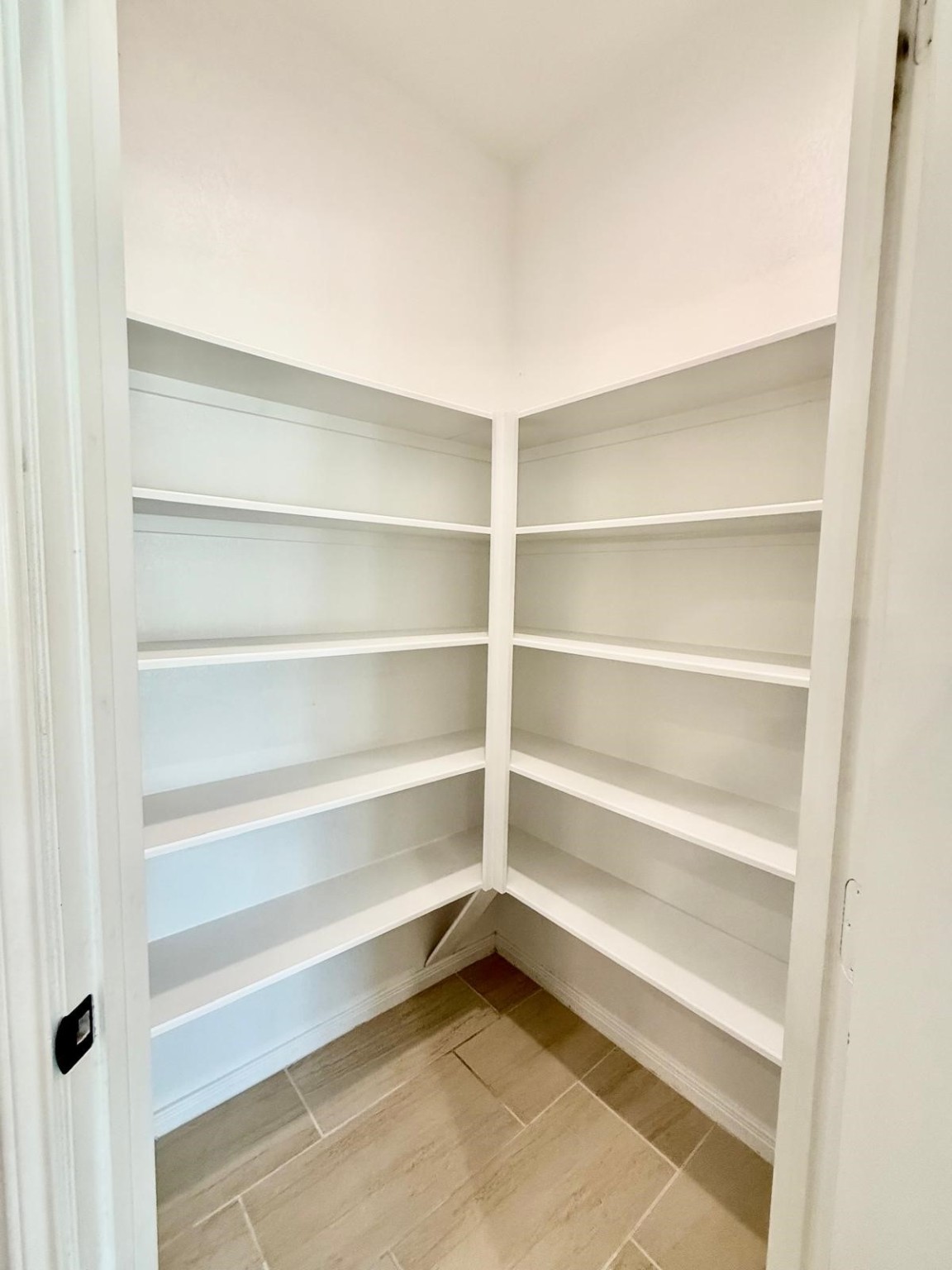 14208 Wallowa Ridge Lane Conroe, TX 77384 - Photo 38 of 48 a view of walk in closet with empty racks