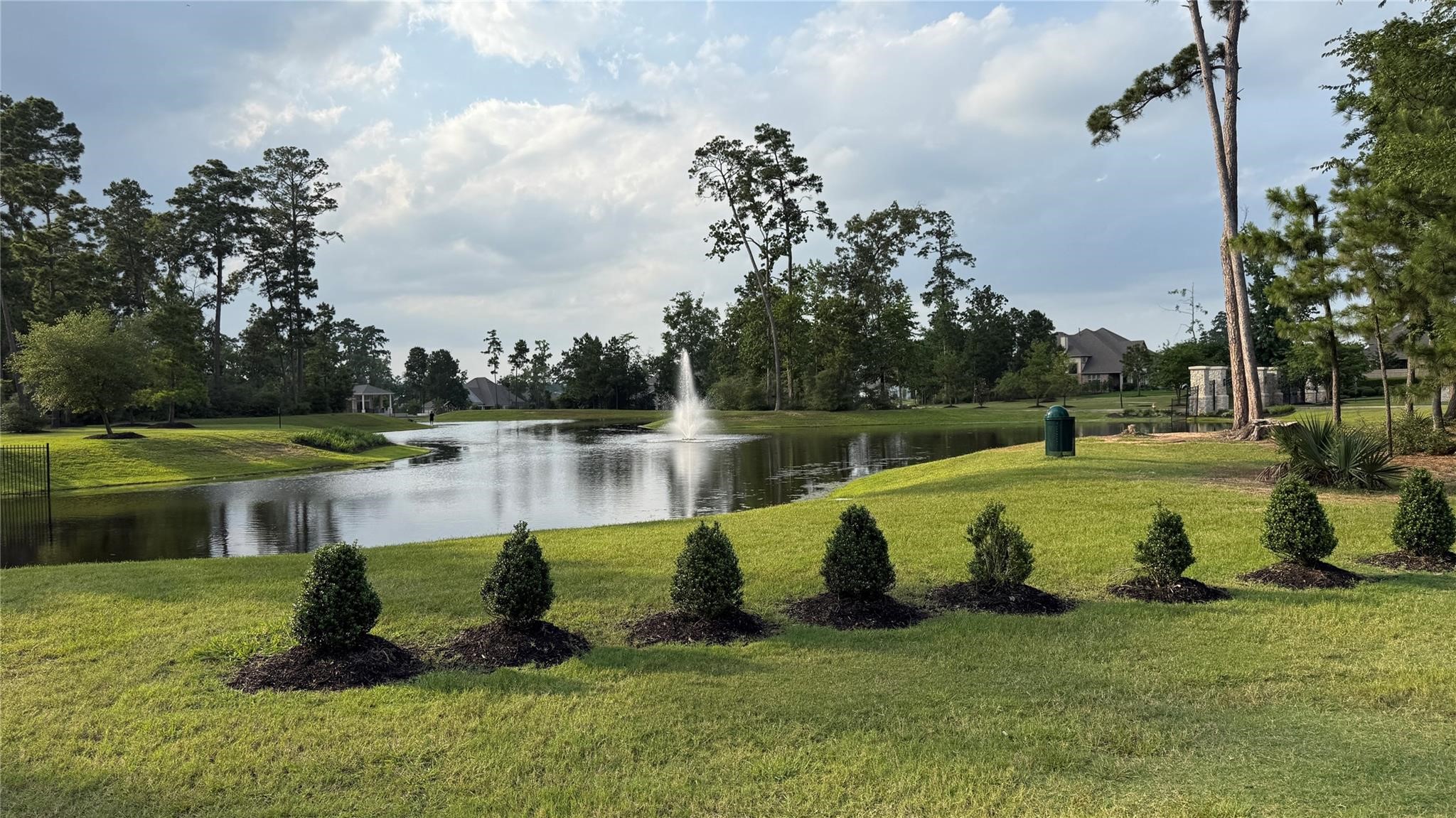 14208 Wallowa Ridge Lane Conroe, TX 77384 - Photo 41 of 48 a view of a swimming pool with a lake view