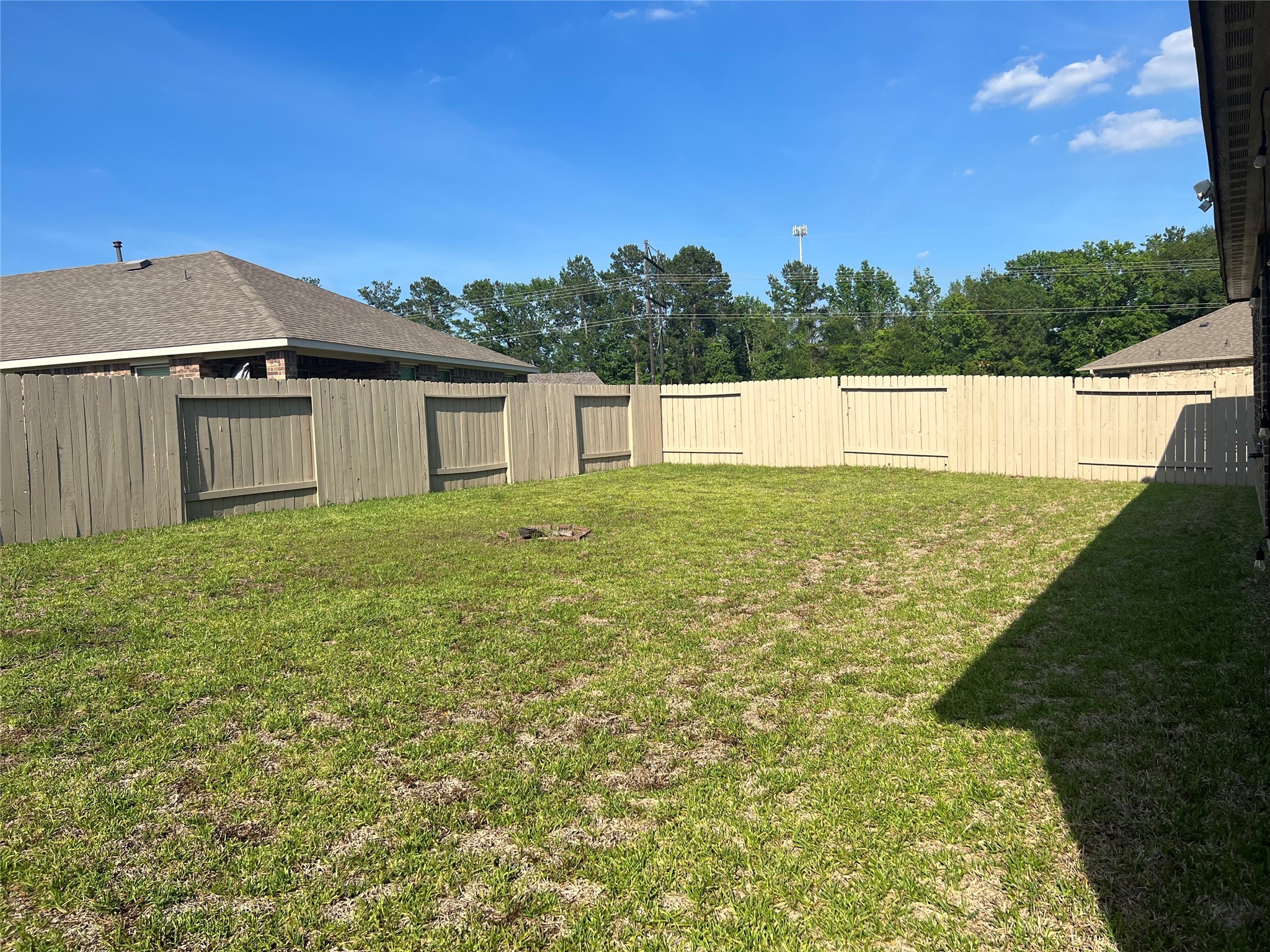 14208 Wallowa Ridge Lane Conroe, TX 77384 - Photo 6 of 48 a view of an outdoor space and a yard