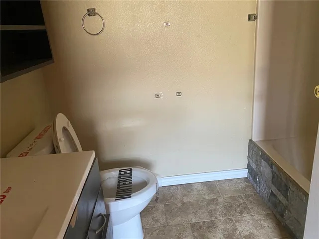 a view of a hallway with a chandelier