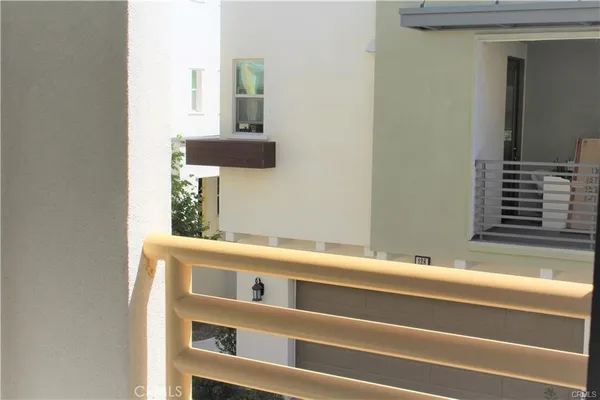 a bathroom with a window and mirror