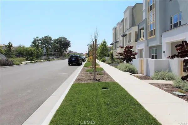 a view of a street with buildings
