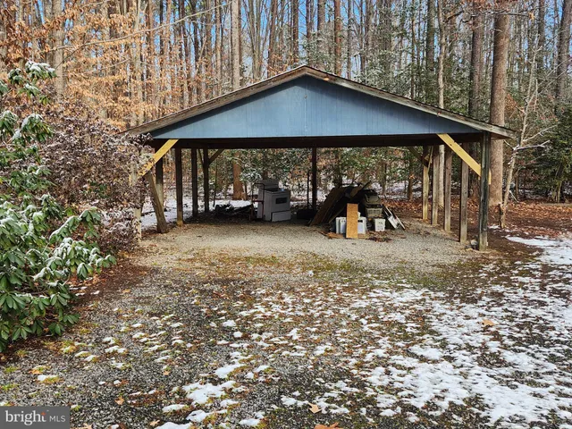an outdoor view of house with green space