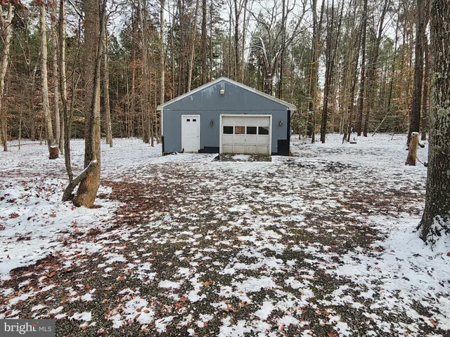 a house with trees in front of it