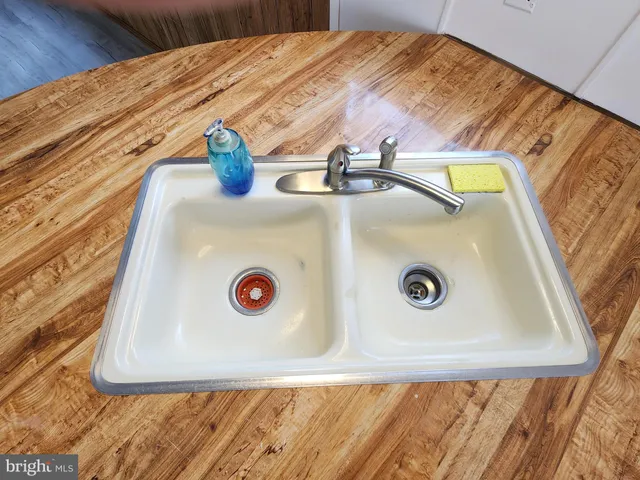 a kitchen with a stove and a refrigerator