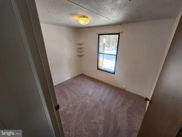 a view of living room with wooden floor