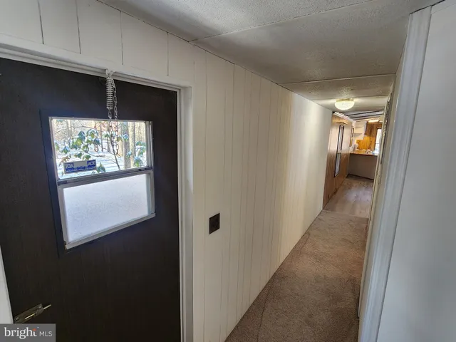 a view of a room that has a window