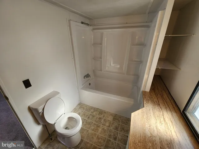 a bathroom with sink and mirror