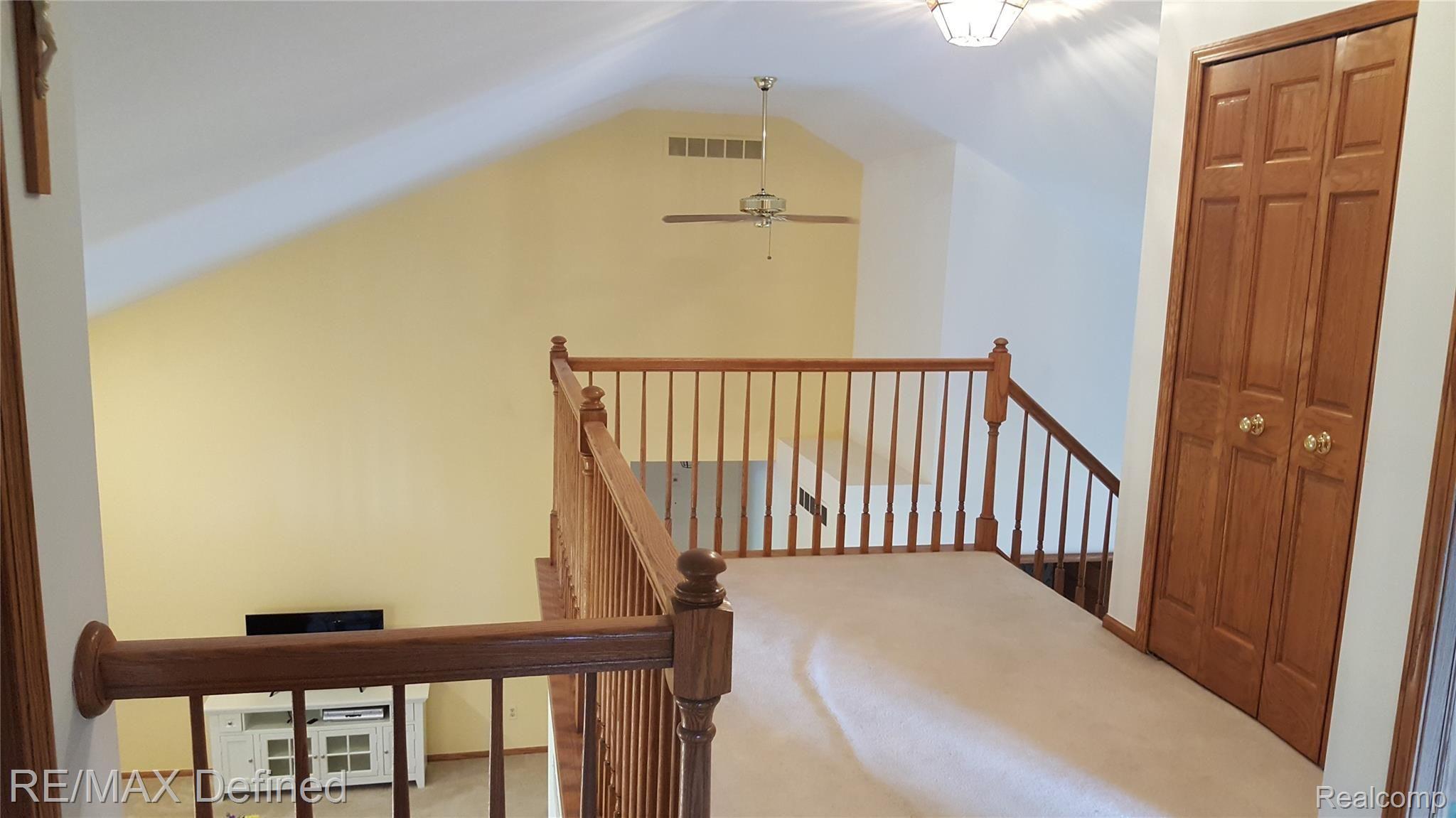 30769 Country Ridge Circle Farmington, MI 48331 - Photo 20 of 31 Bridge overlooking living area