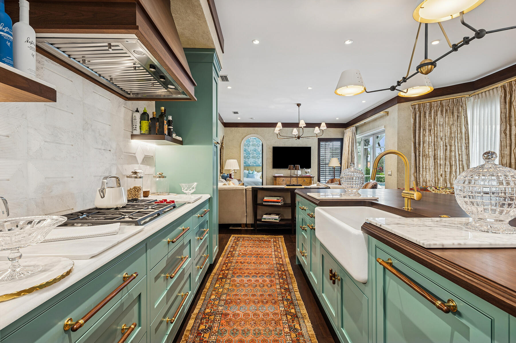 7718 Spring Creek Drive West Palm Beach, FL 33411 - Photo 14 of 72 a large kitchen with stainless steel appliances granite countertop a stove and a sink