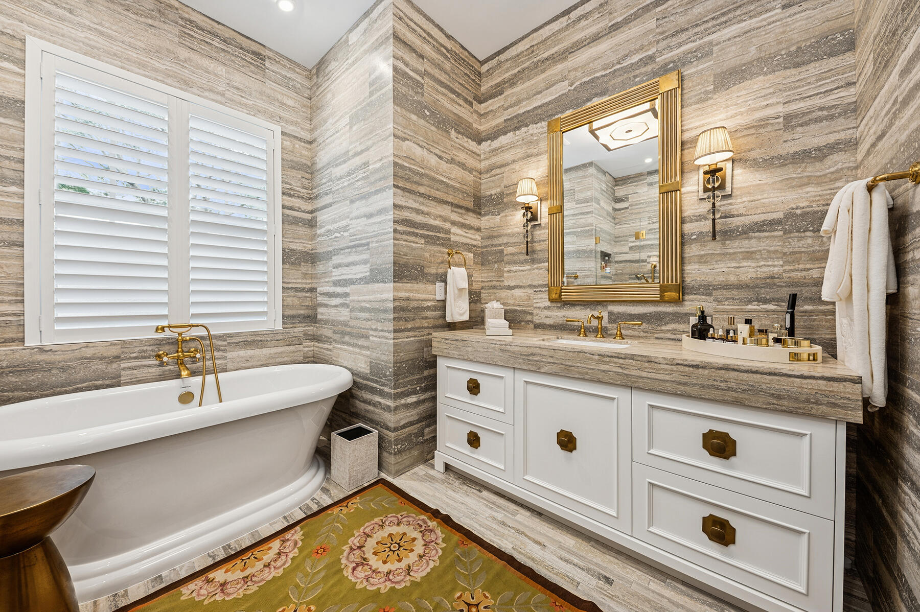 7718 Spring Creek Drive West Palm Beach, FL 33411 - Photo 20 of 72 a spacious bathroom with a granite countertop sink and a large mirror
