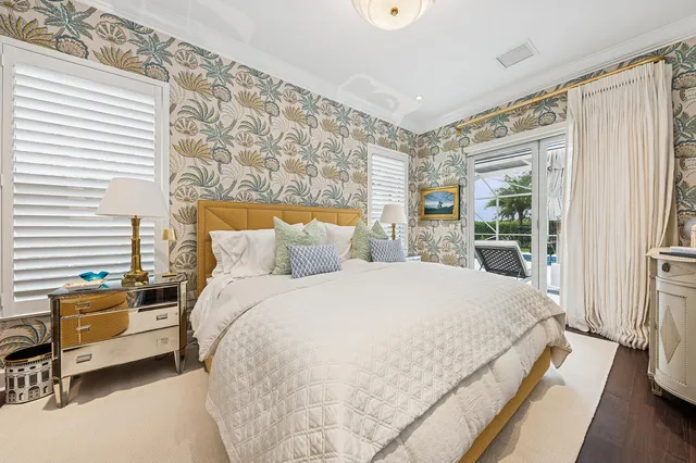 a bathroom with a granite countertop sink a toilet and a mirror