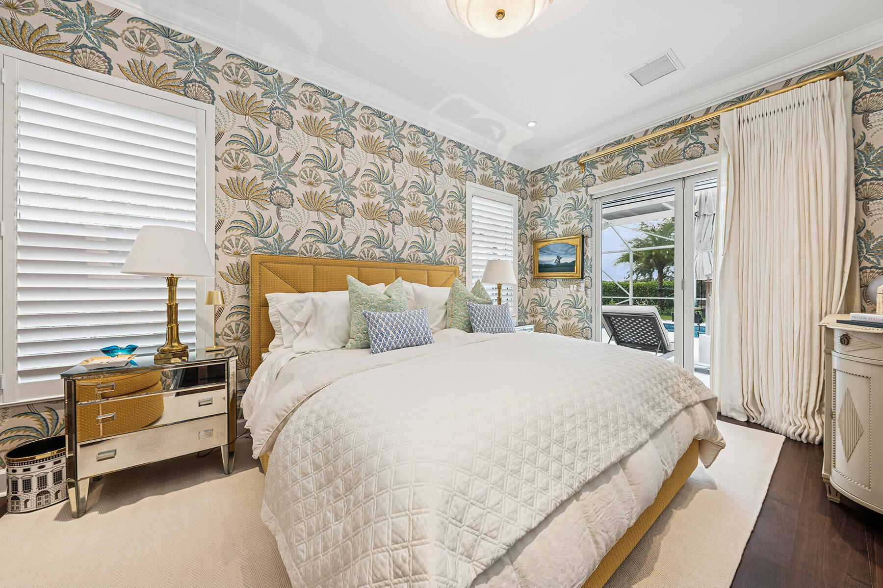 7718 Spring Creek Drive West Palm Beach, FL 33411 - Photo 23 of 72 a bedroom with a bed and wooden floor