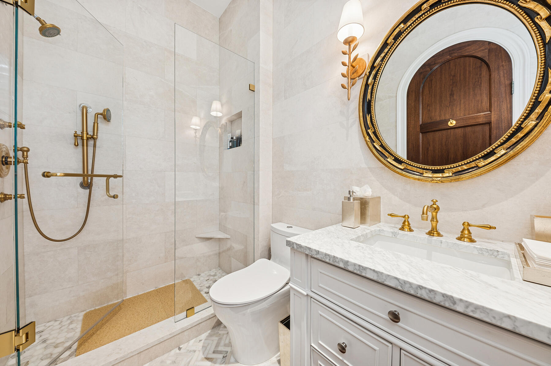 7718 Spring Creek Drive West Palm Beach, FL 33411 - Photo 24 of 72 a bathroom with a granite countertop toilet a sink and a mirror