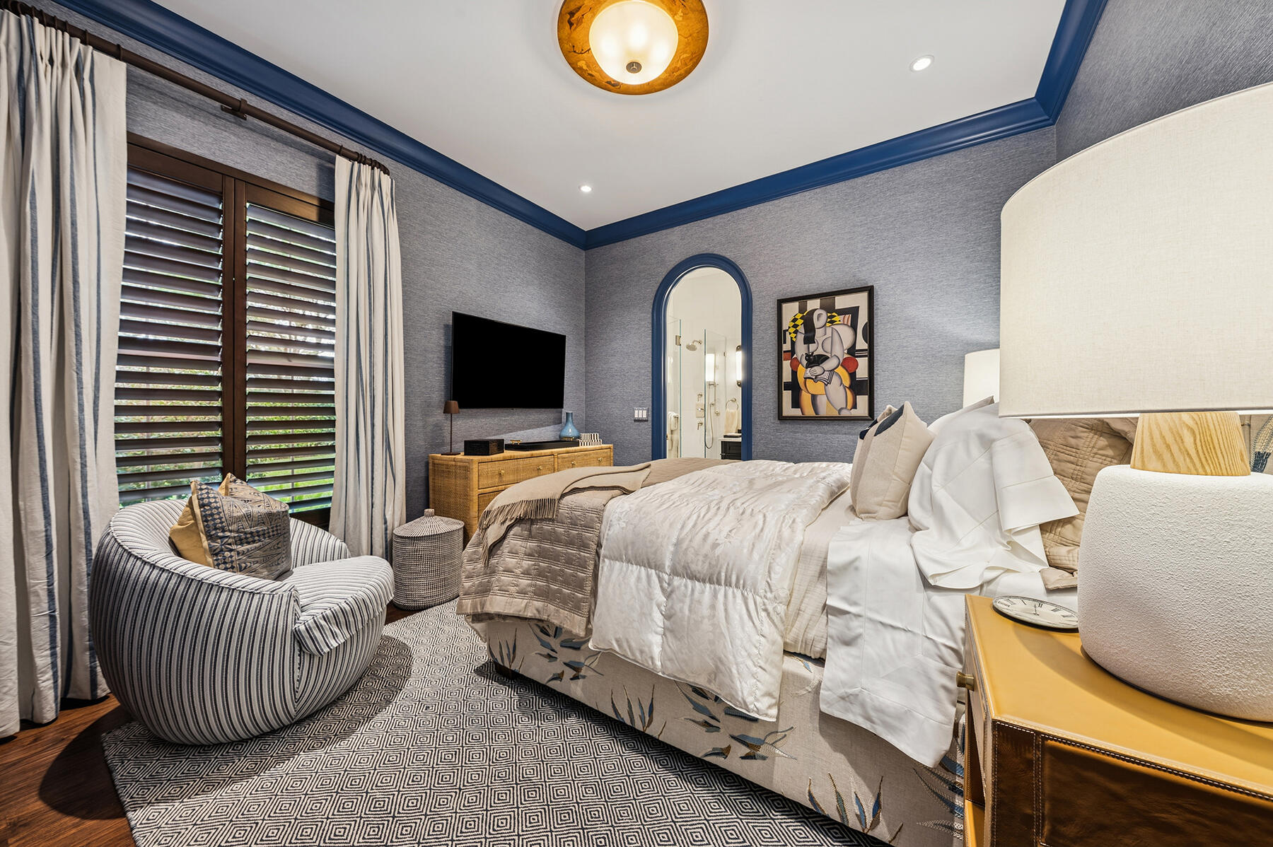 7718 Spring Creek Drive West Palm Beach, FL 33411 - Photo 25 of 72 a bedroom with bed and a flat screen tv