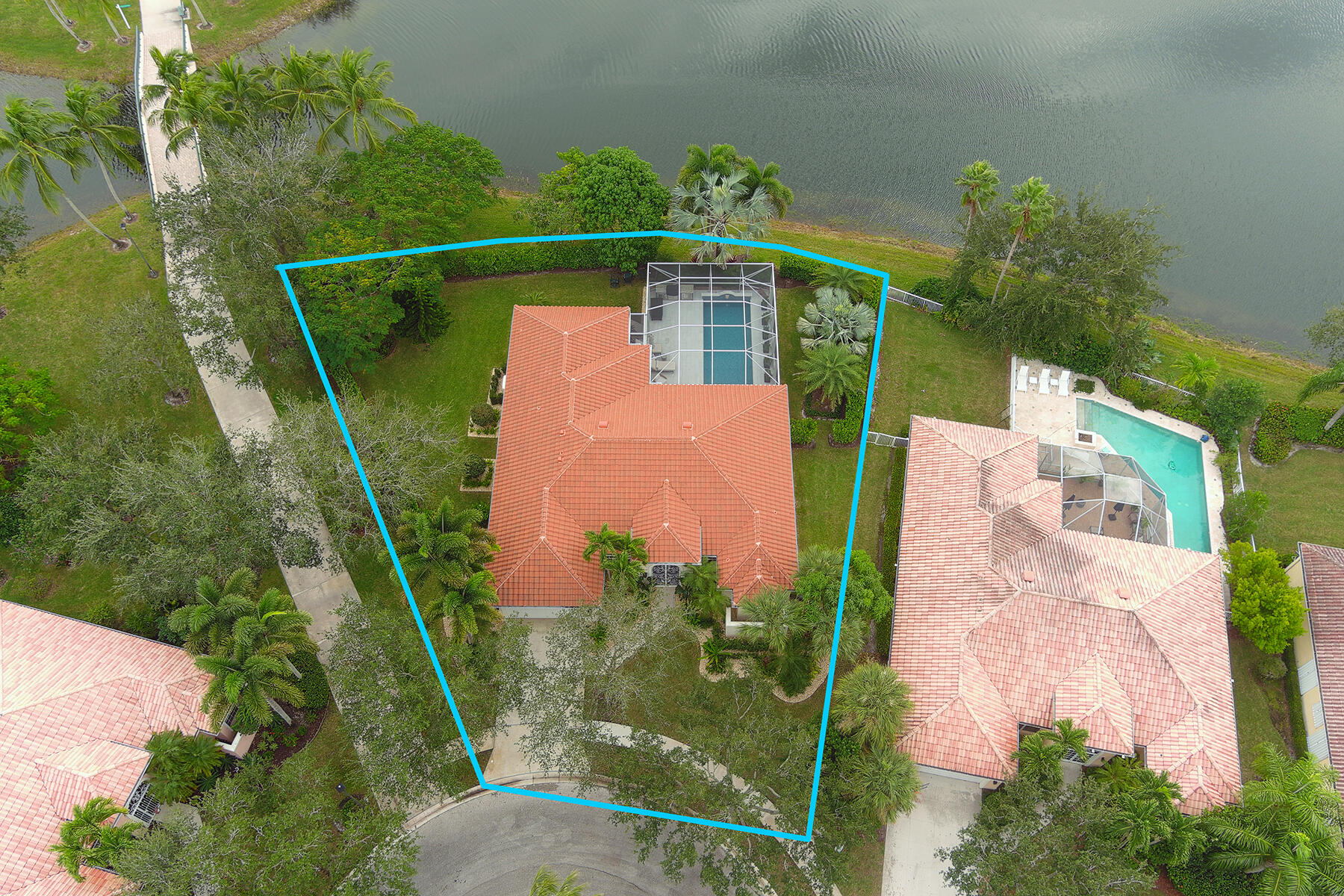 7718 Spring Creek Drive West Palm Beach, FL 33411 - Photo 40 of 72 an aerial view of a house