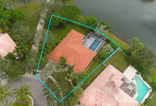 a view of swimming pool with a yard