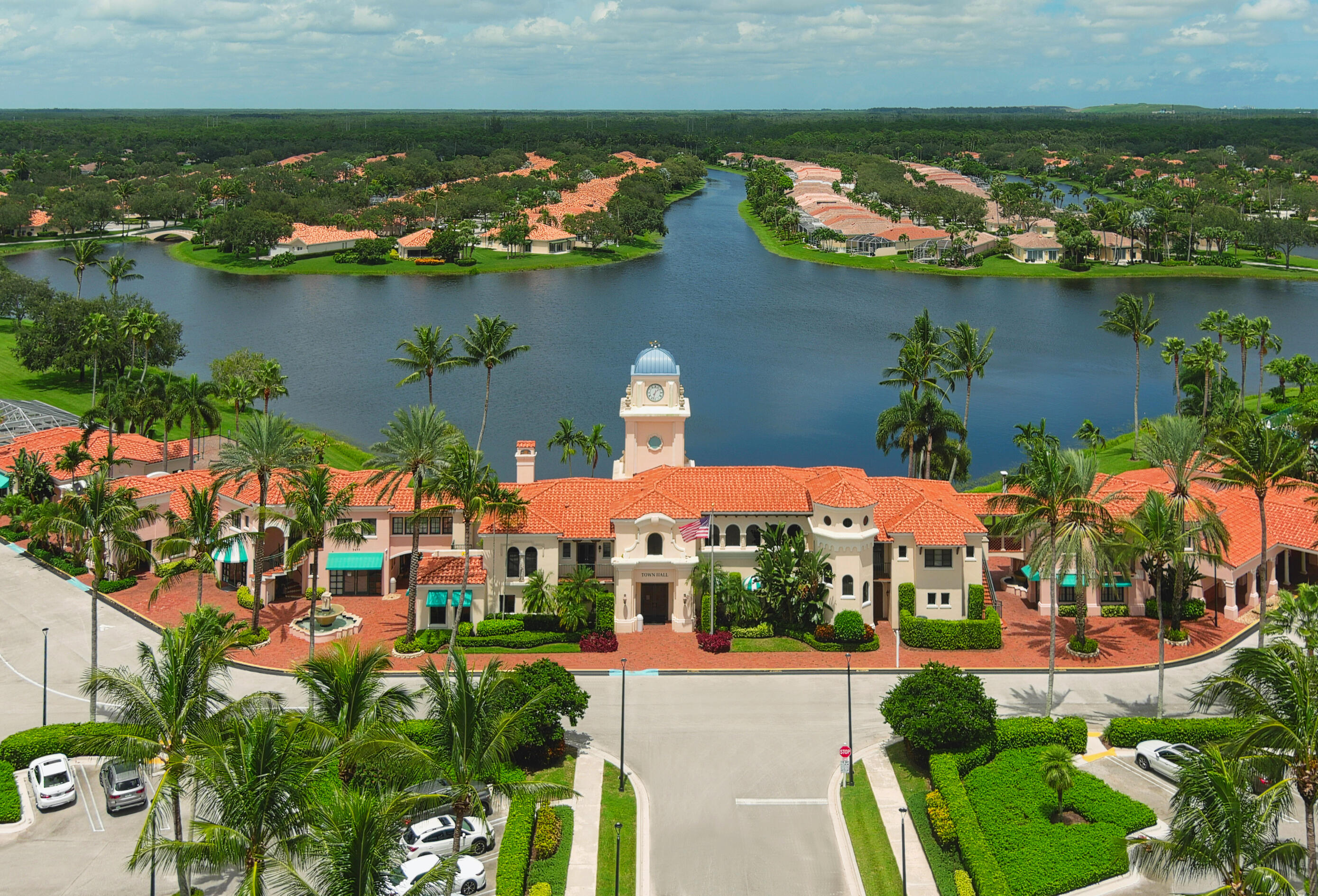 7718 Spring Creek Drive West Palm Beach, FL 33411 - Photo 65 of 72 an aerial view of residential houses with outdoor space and lake view