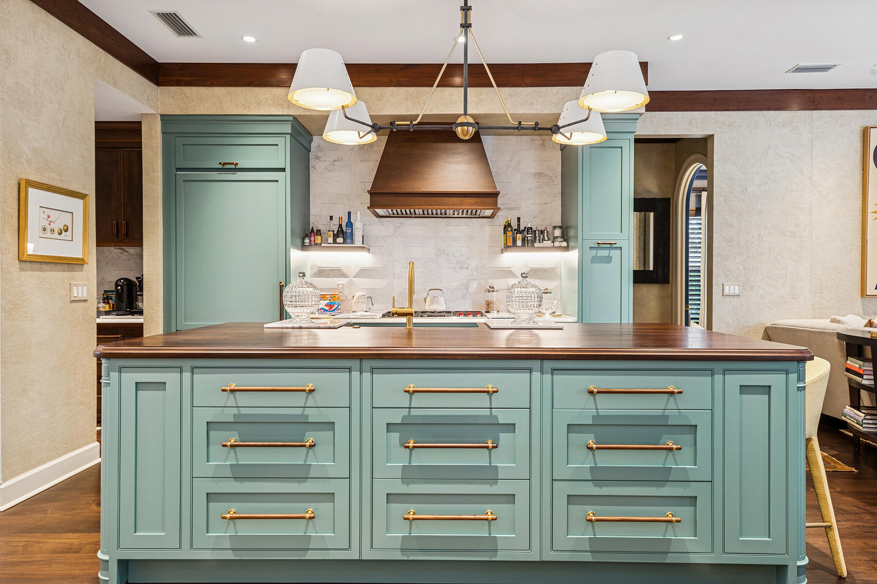 7718 Spring Creek Drive West Palm Beach, FL 33411 - Photo 10 of 72 a kitchen with a cabinets and chandelier