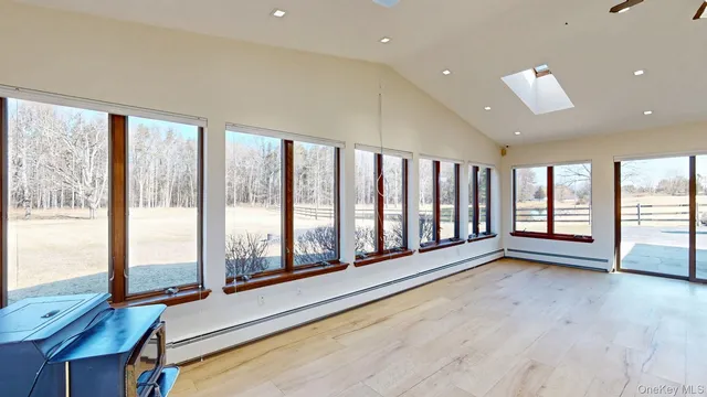 a bedroom with a bed and a ceiling fan
