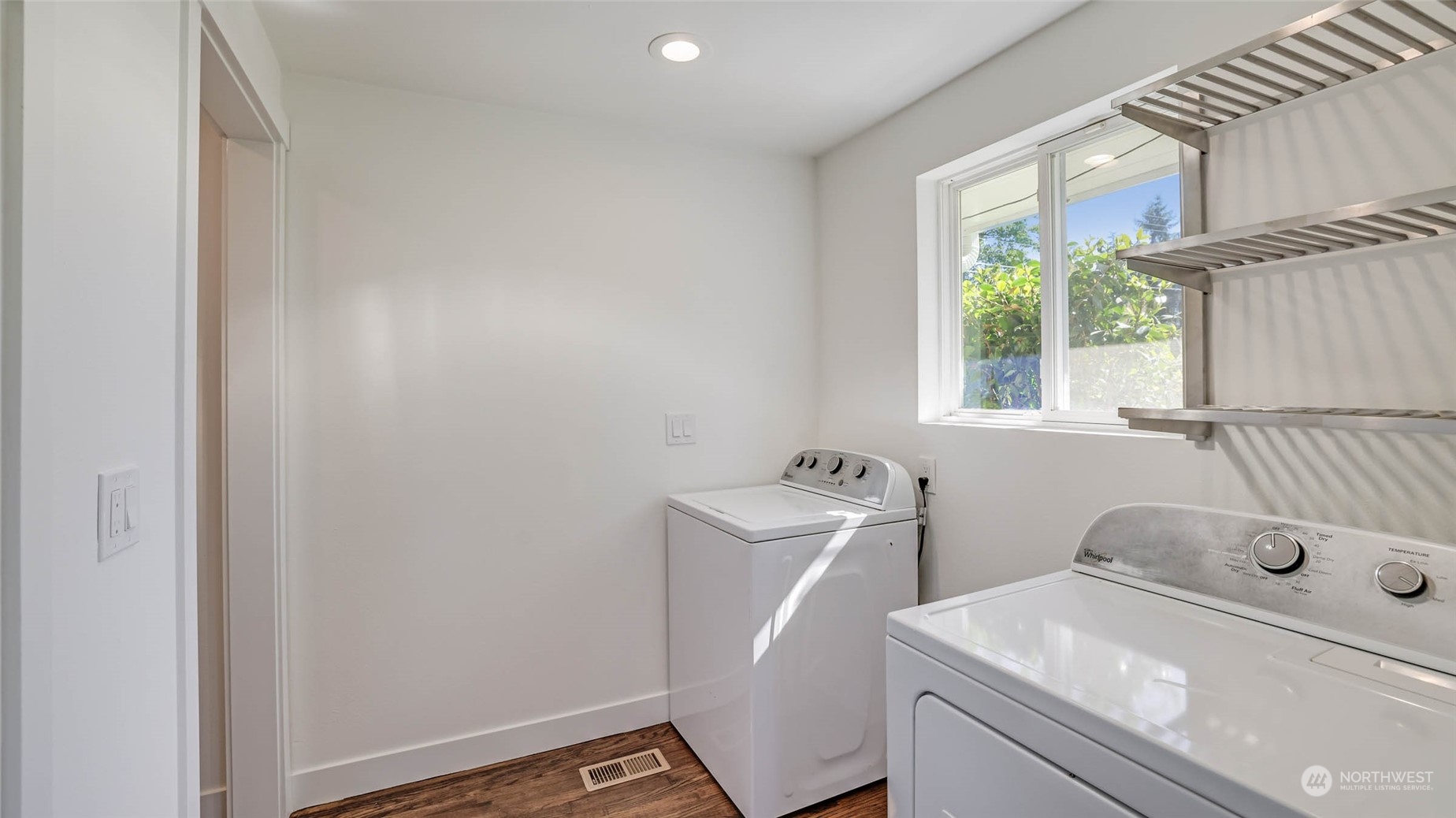 19801 Talbot Road South Renton, WA 98055 - Photo 14 of 20 a bathroom with a sink toilet and window