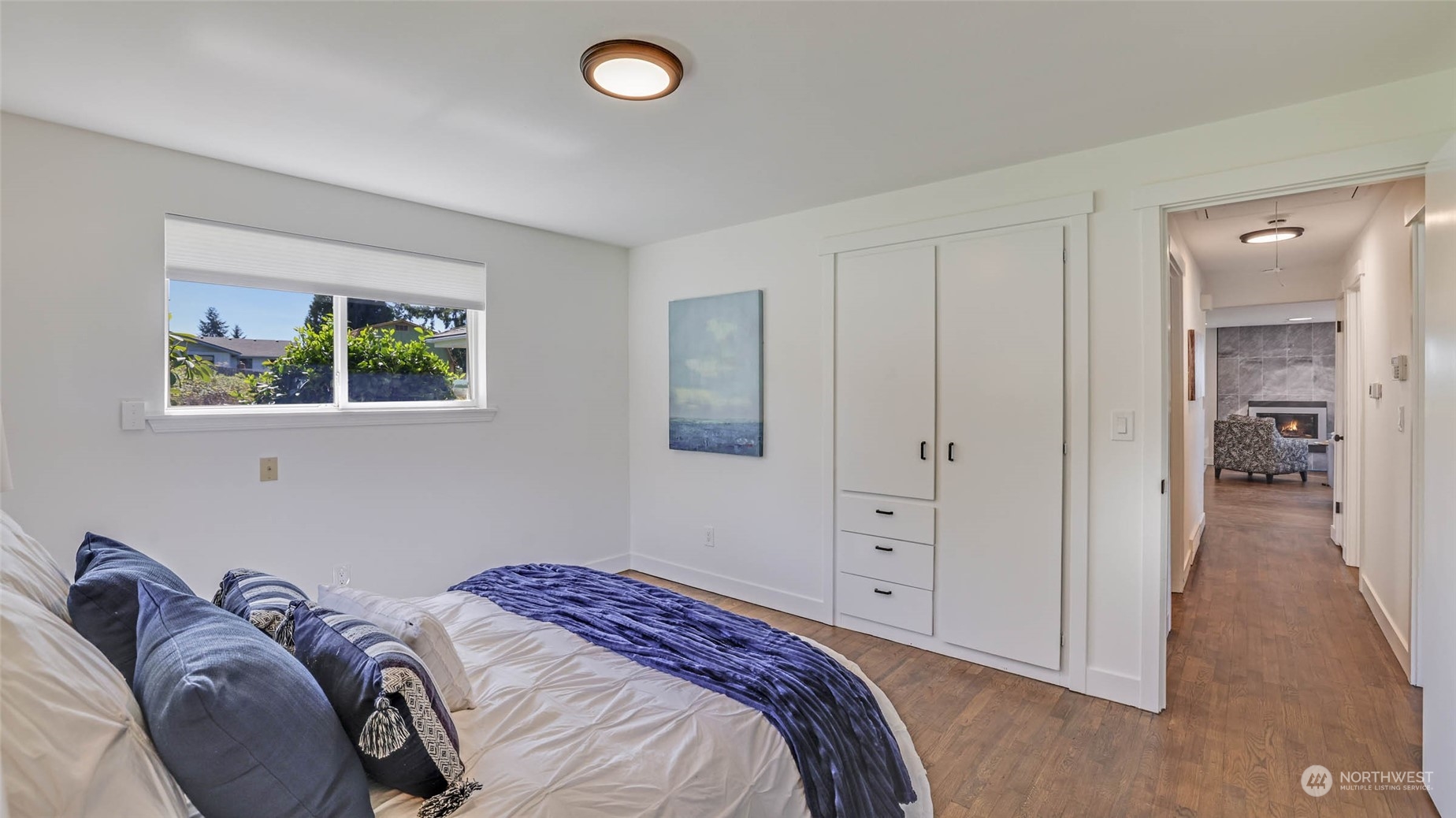 19801 Talbot Road South Renton, WA 98055 - Photo 10 of 20 a bedroom with a bed and a window