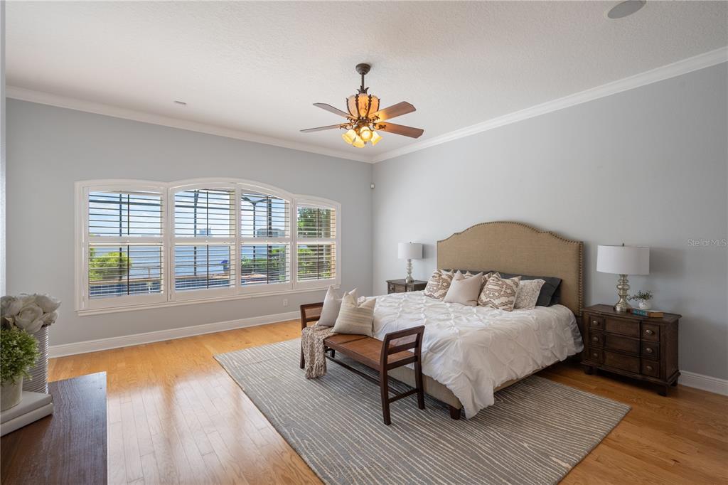 8119 Vía Rosa Orlando, FL 32836 - Photo 18 of 62 a bedroom with a bed and a couch