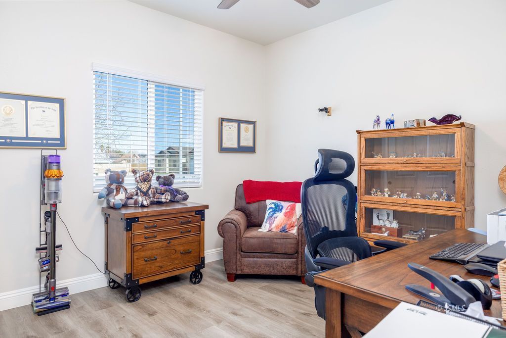 1014 Ocean Avenue Ridgecrest, CA 93555 - Photo 16 of 37 a living room with furniture and a window