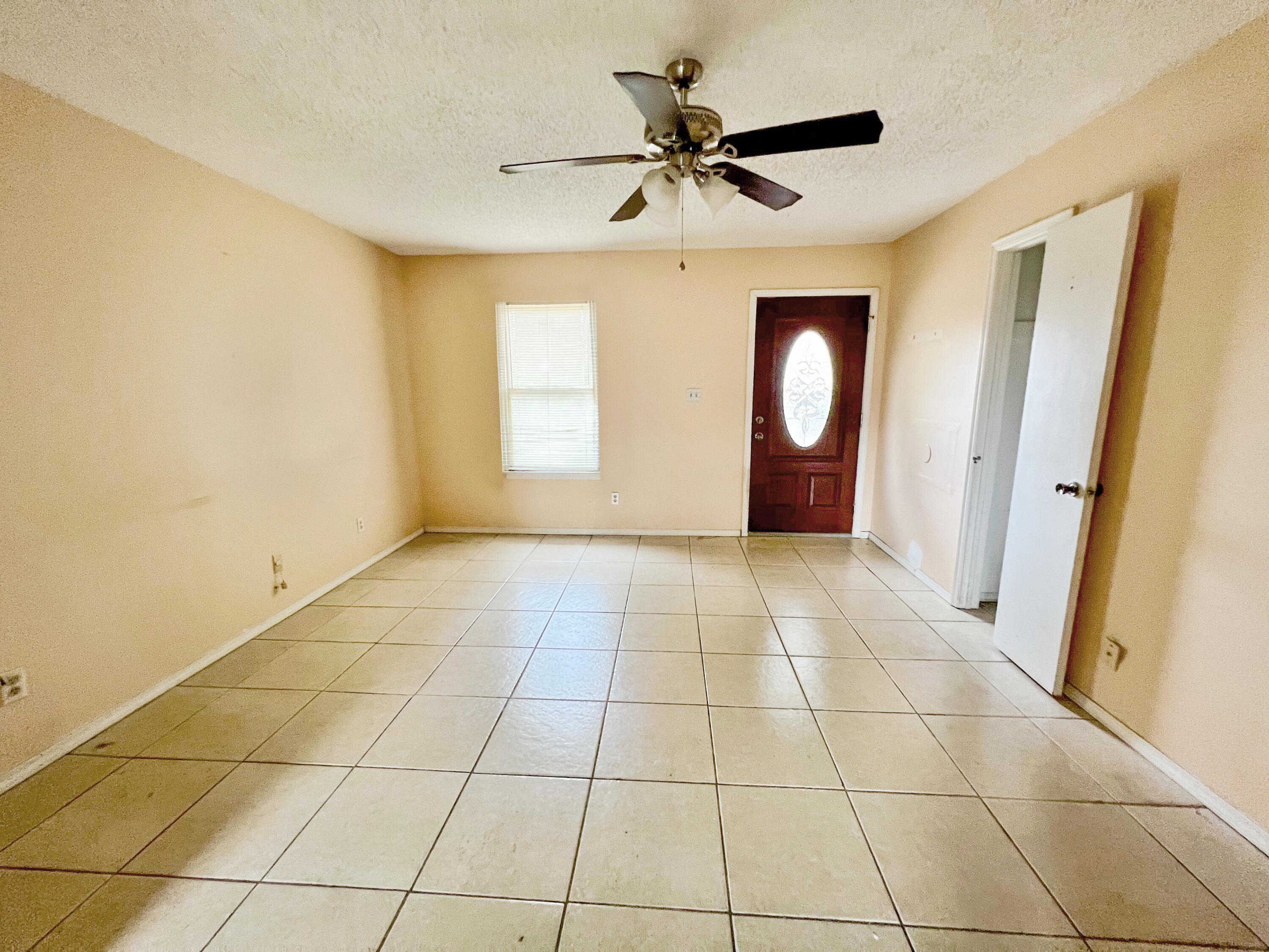 401 Cornwall Circle Pensacola, FL 32514 - Photo 11 of 20 a view of an empty room with a window