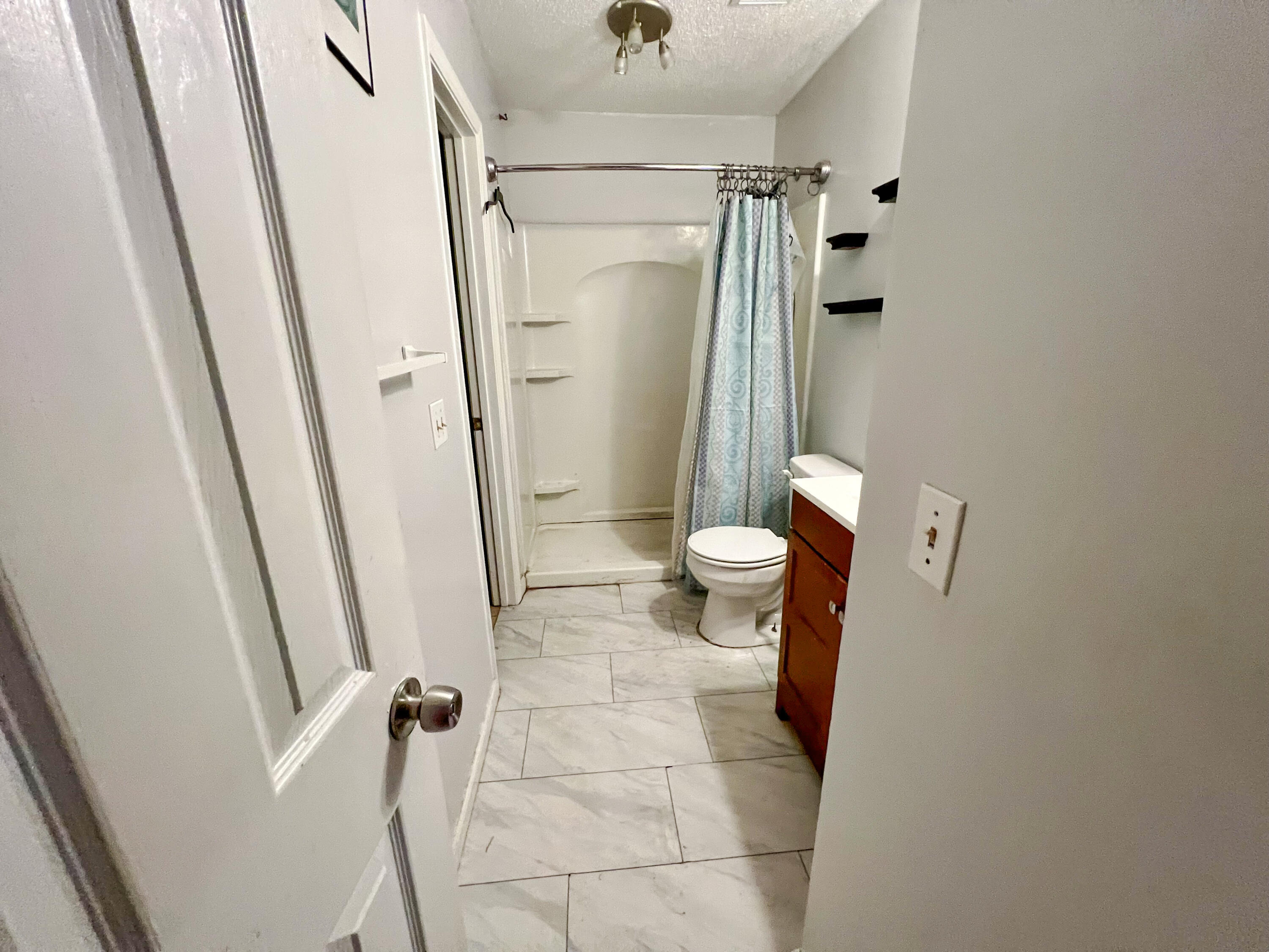 401 Cornwall Circle Pensacola, FL 32514 - Photo 5 of 20 a bathroom with a sink and toilet