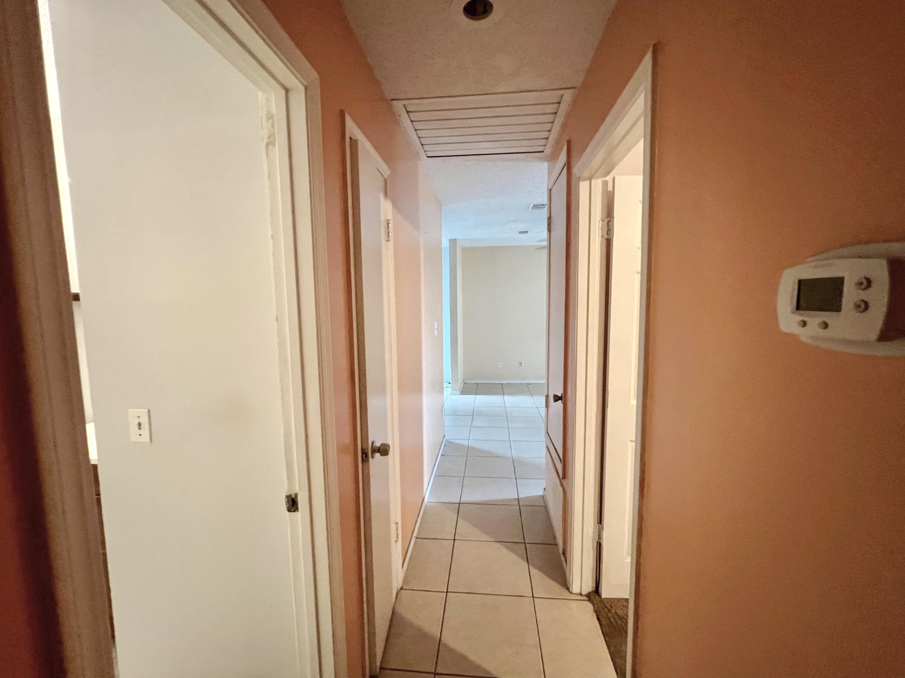 401 Cornwall Circle Pensacola, FL 32514 - Photo 9 of 20 a view of a bathroom from a hallway