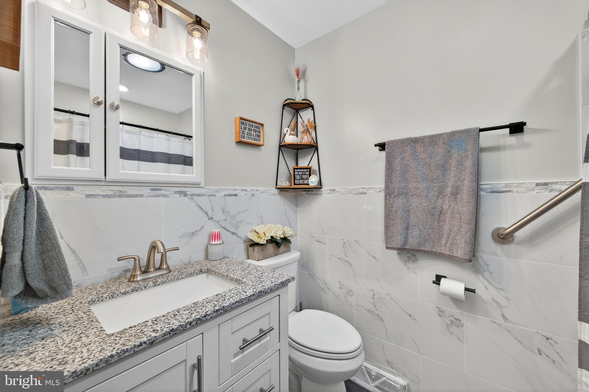 8137 Summit Point Road Charles Town, WV 25414 - Photo 17 of 70 upper-level hall bath