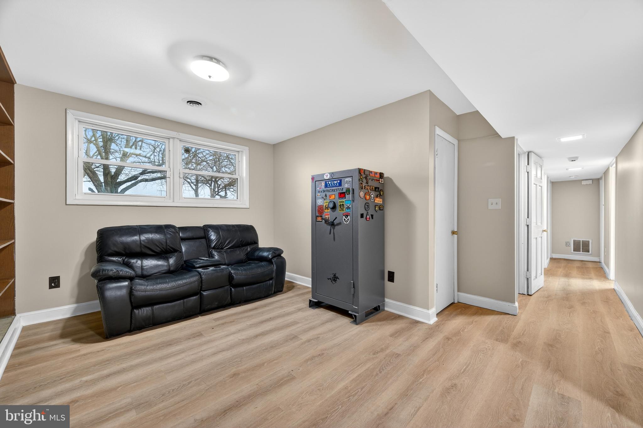 8137 Summit Point Road Charles Town, WV 25414 - Photo 36 of 70 lower-level family room