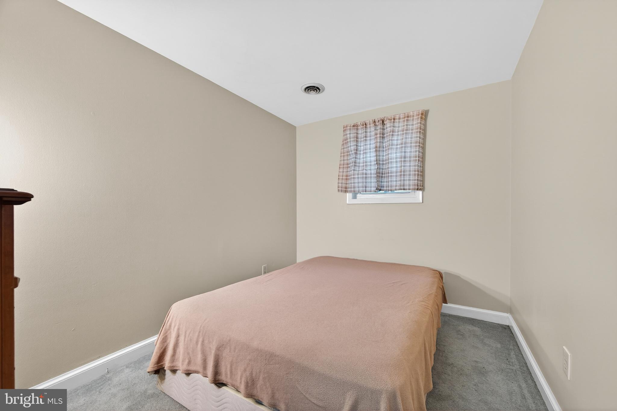 8137 Summit Point Road Charles Town, WV 25414 - Photo 37 of 70 lower-level bedroom #3