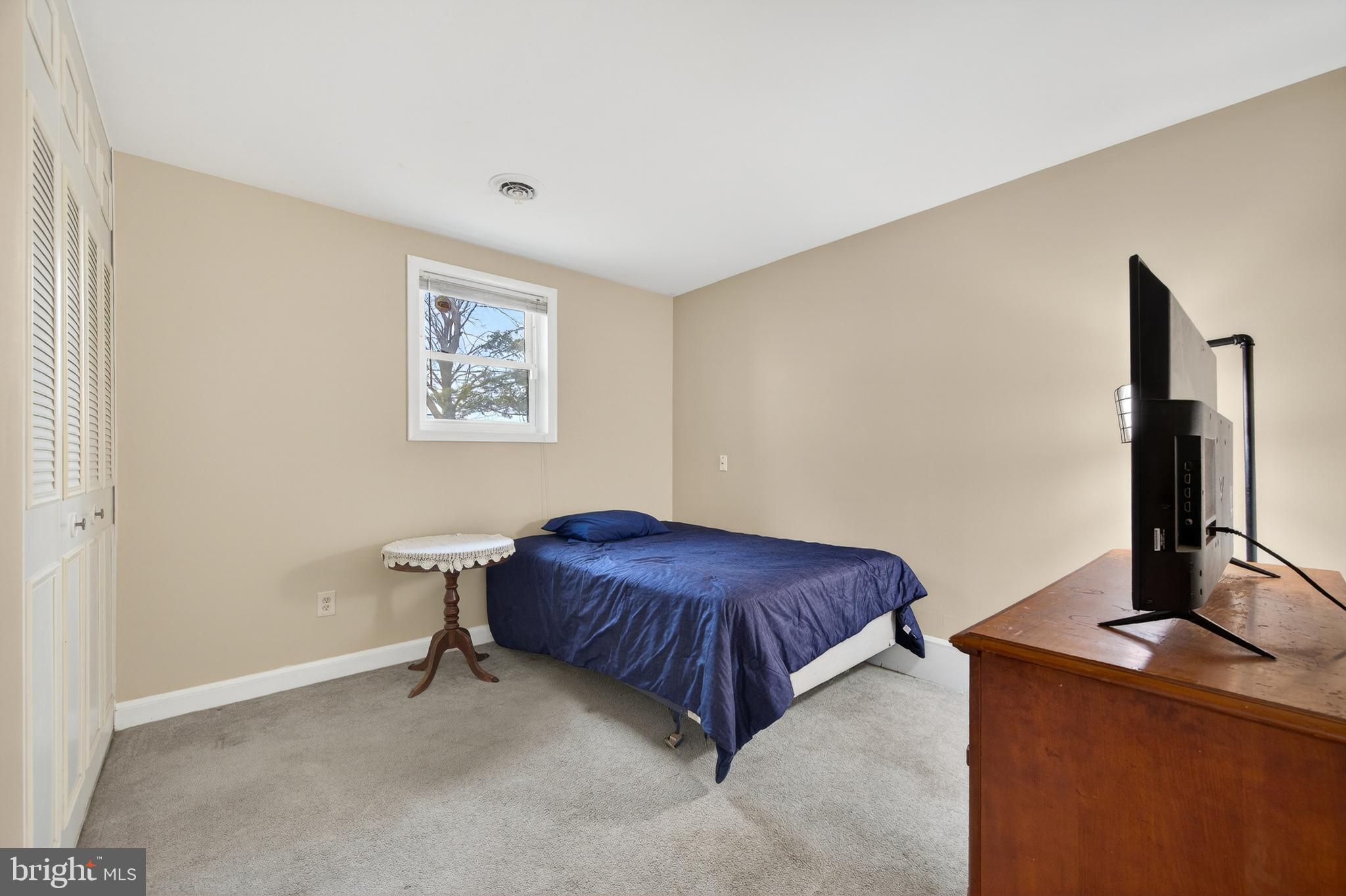 8137 Summit Point Road Charles Town, WV 25414 - Photo 40 of 70 lower-level bedroom #4