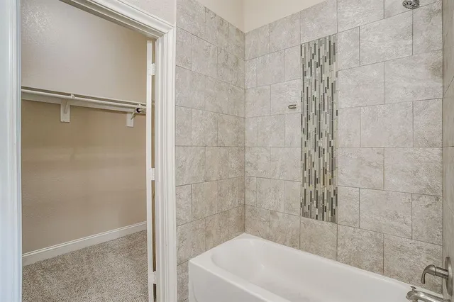 a bathroom with a bathtub