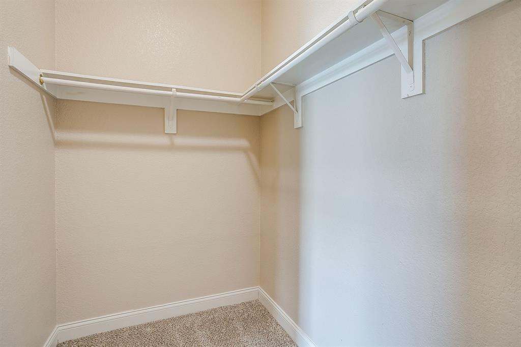 301 County Road 207, Unit 1206 Alvarado, TX 76009 - Photo 12 of 30 a view of an empty walk in closet