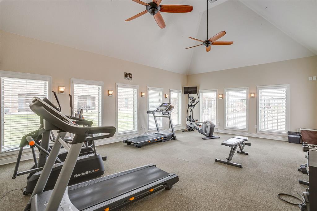 301 County Road 207, Unit 1206 Alvarado, TX 76009 - Photo 20 of 30 a room with gym equipment and windows