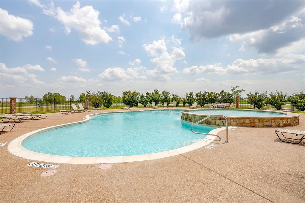 301 County Road 207, Unit 1206 Alvarado, TX 76009 - Photo 30 of 30 a view of a swimming pool with a yard