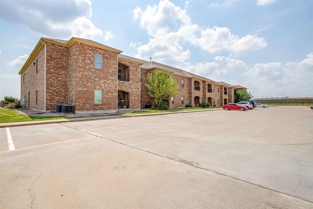 301 County Road 207, Unit 1206 Alvarado, TX 76009 - Photo 4 of 30 a view of swimming pool in front of building