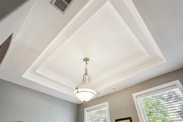 a view of parking garage with cars