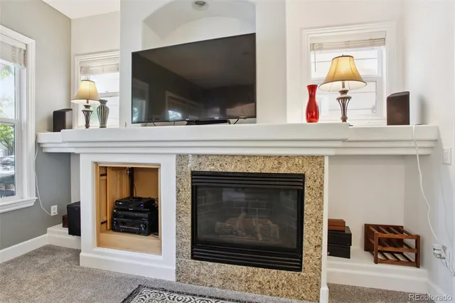 a view of living room with furniture and flat screen tv