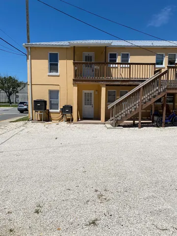 a view of pool with outdoor seating