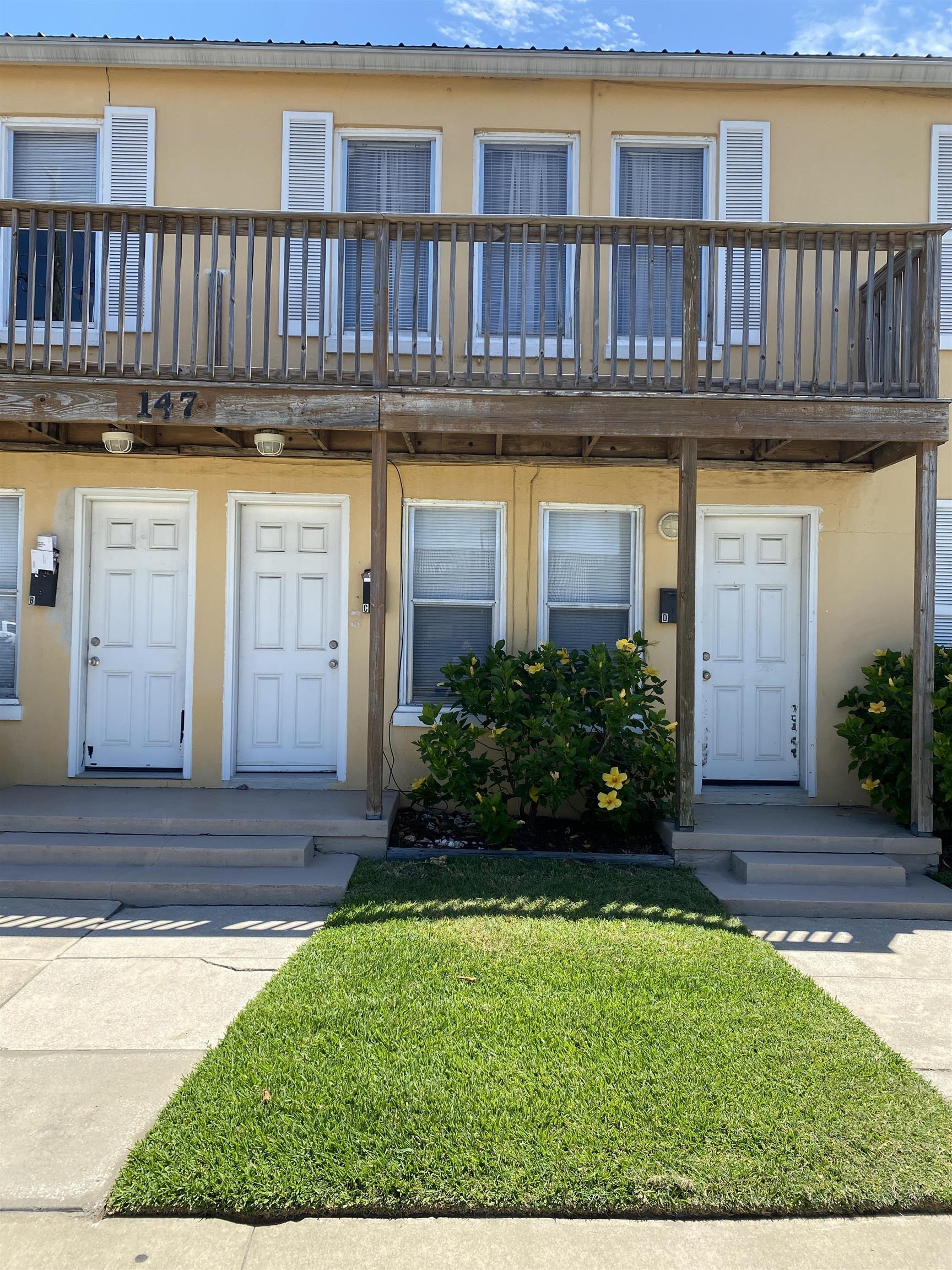 147 Riberia Street, Unit D St. Augustine, FL 32084 - Photo 19 of 19 a view of front door of house with yard